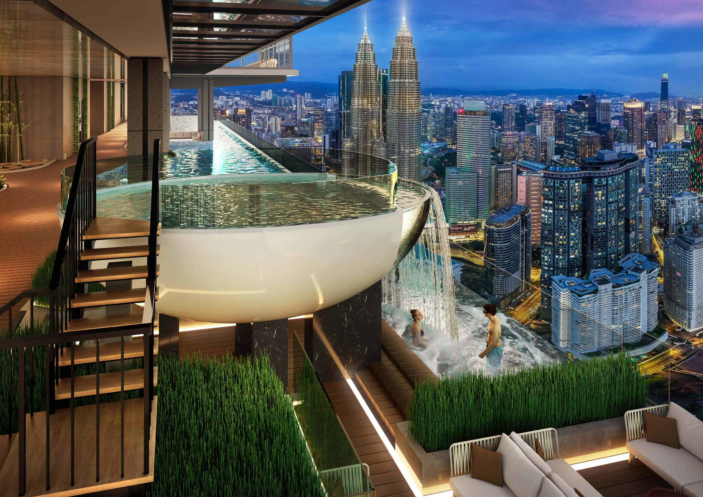 Elevated heated pool on a rooftop deck at dusk, overlooking the Kuala Lumpur skyline and Petronas Twin Towers